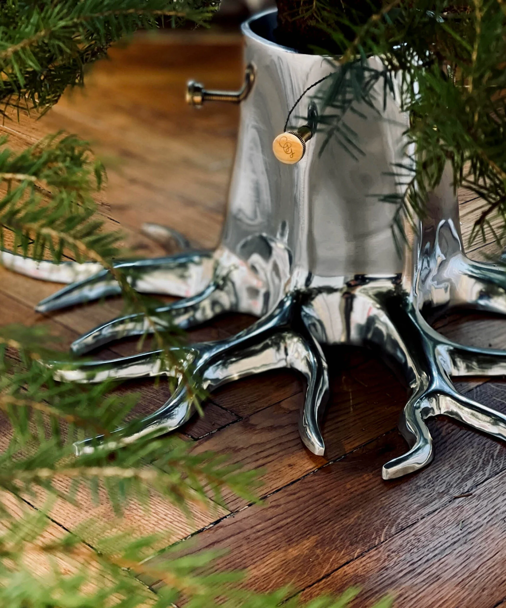 CHRISTMAS TREE STAND “THE ROOT” – SILVER – © Heimili & Garðar ehf